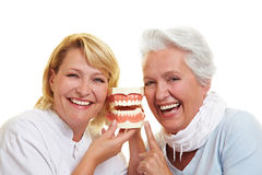 http://www.dreamstime.com/royalty-free-stock-images-smiling-dentist-senior-woman-image21122749